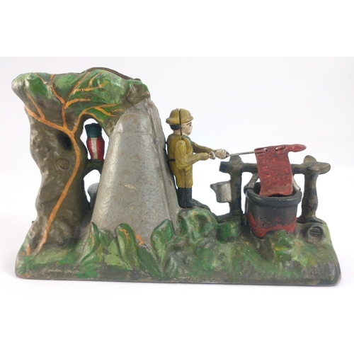 387 - A cast iron reproduction money box of a Boy Scout Camp.  In good condition, flag works well. 23cm lo... 