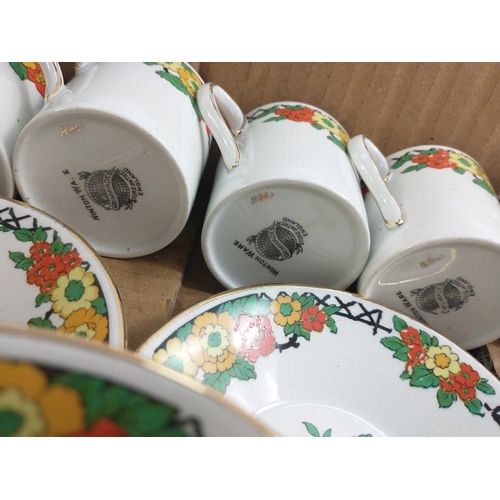 414 - A GRIMWADES MINTON ware coffee set to include 6 cups and 5 saucers. In good condition.#413