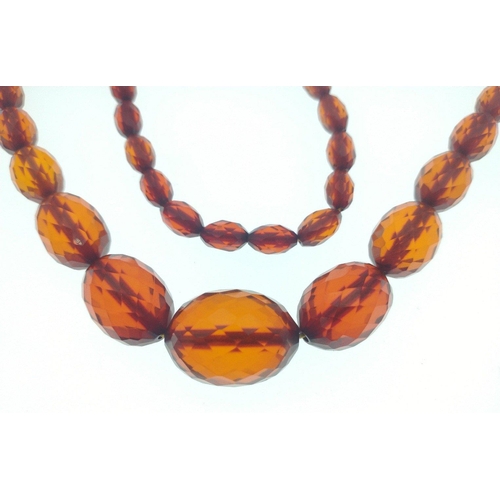 46 - A WHOPPER!!
VINTAGE AMBER style (untested) necklace weight 59g approx - length doubled up 45cm appro... 