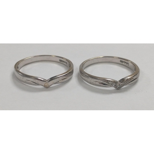 5 - A box containing two rings.  One with a wishbone style with diamond chips stamped 375 size P gross w... 