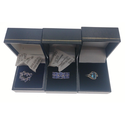 50 - Three boxed STERLING SILVER dress rings in lovely condition.  One with 10 lovely large blue stones s... 