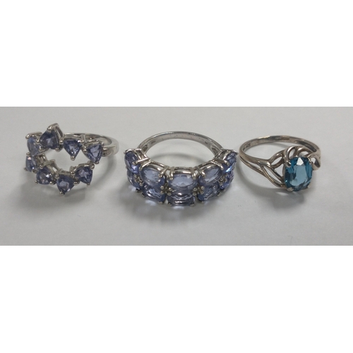 50 - Three boxed STERLING SILVER dress rings in lovely condition.  One with 10 lovely large blue stones s... 