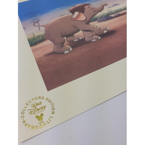 531 - A WALT DISNEY Studios collectors print from 1995 of Mowgli leading the baby Elephant.  Minor wrinkle... 