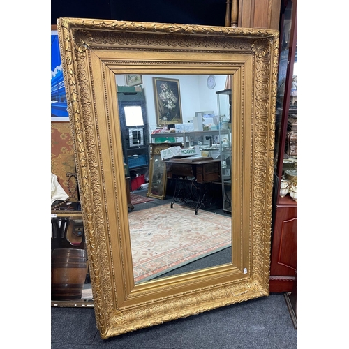 548 - A SUBSTANTIAL FRENCH ANTIQUE frame with a quality mirror which has been added - dimensions 150cm x 1... 