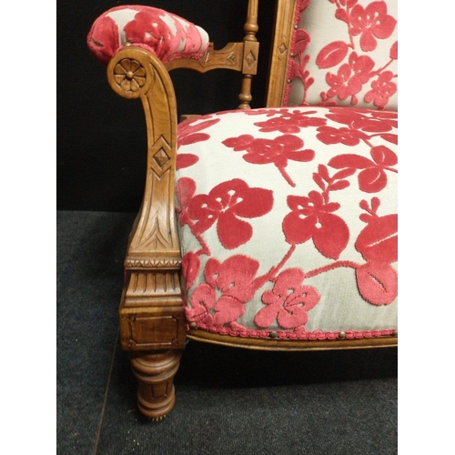 565A - A nice EDWARDIAN parlour couch with oak frame which has just been newly re-covered in a striking red... 