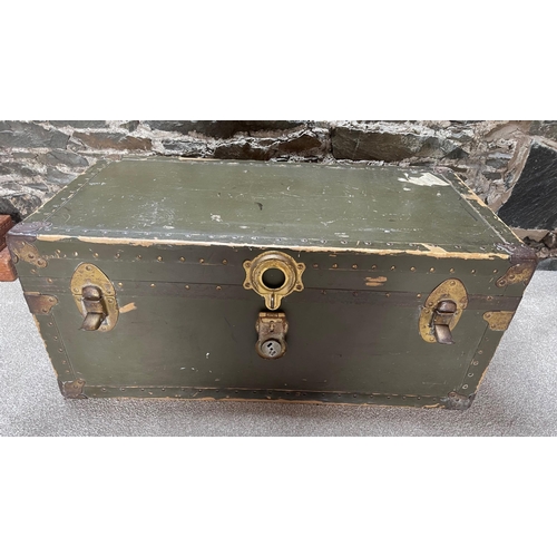 613 - VINTAGE! A hard-shell travelling-trunk finished in green -  with metal bindings - 80cm length x 43cm... 