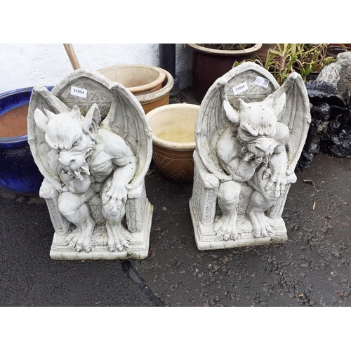 621 - A pair of deliciously evil-looking GROTESQUES each standing approx 50cm high#625