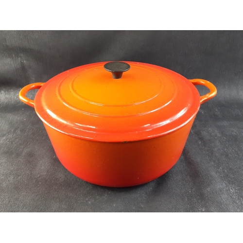 643 - A large volcanic orange LE CREUSET casserole dish (well-used) 27cm dia x12cm#647