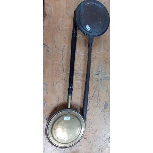 644 - Winter is coming - keep the chills out with these two vintage wooden-handled warming pans, one brass... 