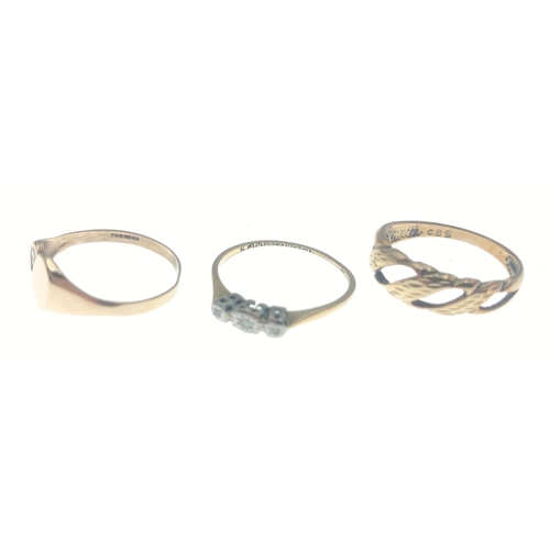 7 - Three rings.  One with three small diamond chips and marked 18ct Plat size N 1.3g approx, one yellow... 