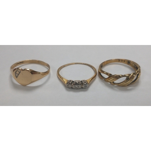 7 - Three rings.  One with three small diamond chips and marked 18ct Plat size N 1.3g approx, one yellow... 