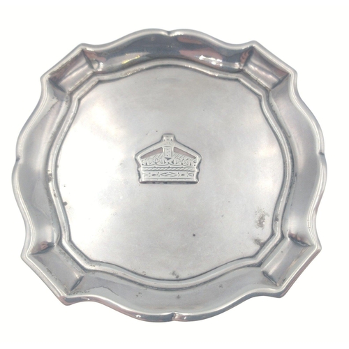 134 - A small SILVER tray with crown centre.  Maker's stamp GS& Co. London 1936, diameter 8cm, weight ... 