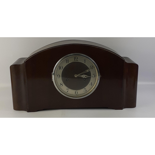 158 - A large wooden VINTAGE mantle clock.  Measures 45cm across approx. Supplied without key.#18