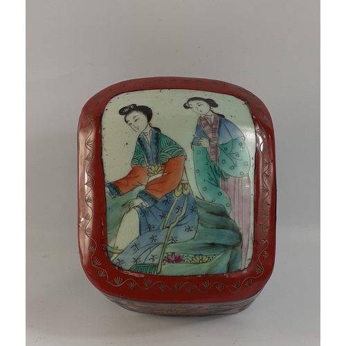 251 - An unusual red lacquered box with a heavy ceramic lid with hand-painted Oriental ladies, measures 11... 
