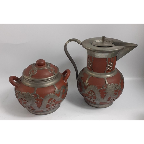 268 - Two pieces from the TUNG KING SUN Factory Weihaiwei No.1, being a red clay lidded pot and teapot bot... 