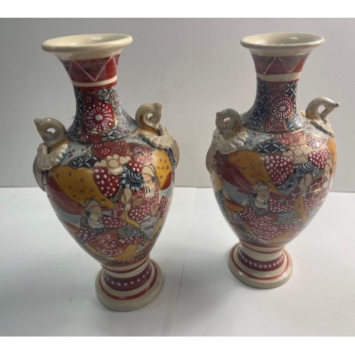 287 - A pair of SATSUMA urn jugs nicely decorated with traditional Oriental gentlemen standing approx 25cm... 