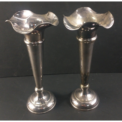 89 - A striking pair of  WALKER & HALL silver plated tulip vases. Each standing 25cm tall approx and ... 