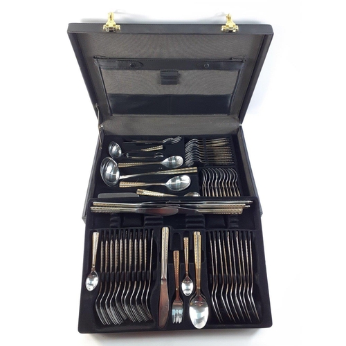 118 - A briefcase with a double layer of plated 'ROSTFREI EDELSTAHL' cutlery.  Appears complete and in goo... 