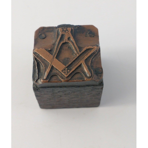 163 - A very interesting and unusual small printer's block with MASONIC symbol.  20mm across.#162