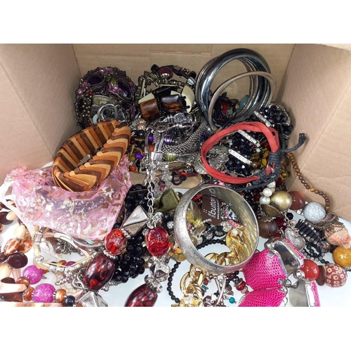 30 - A box full of costume beads, bangles and bracelets of all descriptions#30