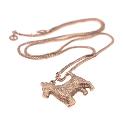 4 - A 375 marked gold chain with an unmarked yellow metal Scottie Dog Pendant.  Clasp and chain with dam... 