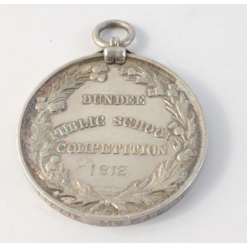 52 - 1912 DUNDEE PUBLIC SCHOOLS silver medal for Scottish Song.  Rubbed hallmarks 4cm diameter 27.5g#52... 