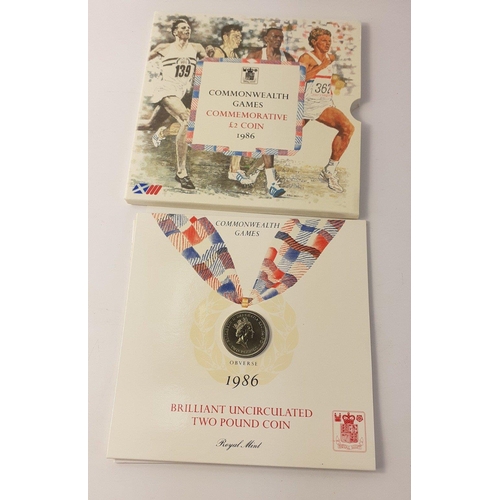 69 - An EEC MEDALLIC First Day Cover in original packaging, a Commonwealth Games 1986 commemorative £2 co... 