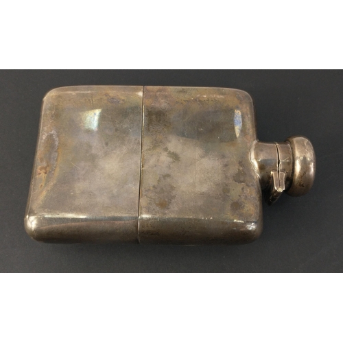 81 - A silver Birmingham 1923, hip flask hallmarked on base, shoulder and lid with gilt interior, length ... 