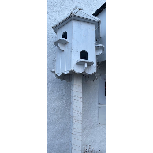 209 - An almost new garden joiner-made LARGE wooden DOVECOT finished in white - around 9ft/10ft tall appro... 