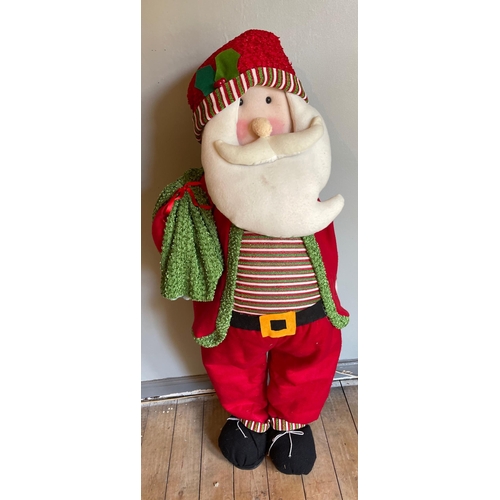 269 - HO HO HO - A large 4ft tall standing Santa - of fabric construction with a wire frame etc#48