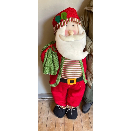 269 - HO HO HO - A large 4ft tall standing Santa - of fabric construction with a wire frame etc#48