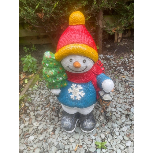 273 - XMAS OUTDOOR STONE GARDEN ORNAMENT - large snowman holding a small Xmas tree and a lantern on the ot... 