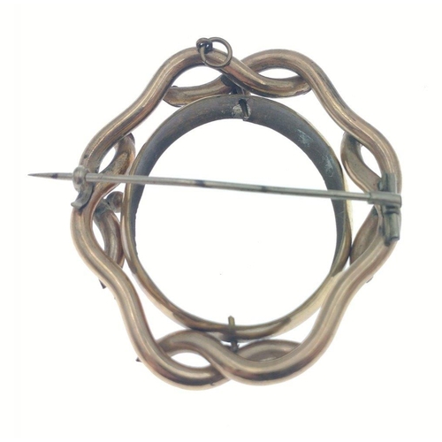 12 - A large unmarked yellow metal plaid brooch with some nice engraving, 60mm x55mm, weight 20.6g approx... 