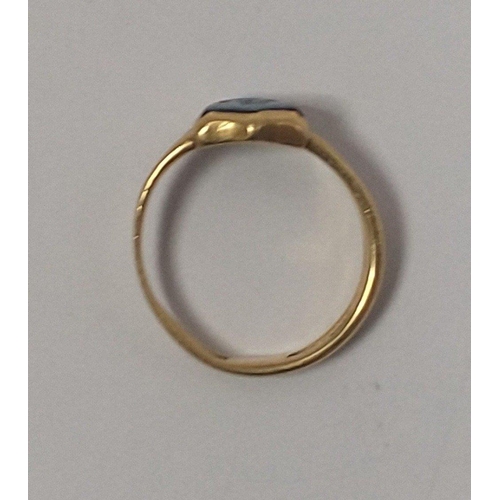 13 - An unmarked yellow metal ring with well-worn marks, size M, with a seal with the letter 'S', gross w... 