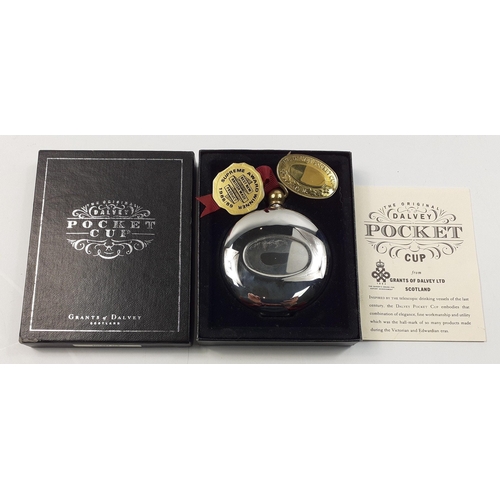 31 - A collection of hip flasks to include a boxed DALVEY pocket cup, a boxed SELKIRK golf challenge silv... 