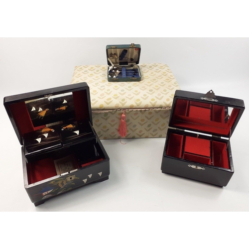 34 - A plush silk lined box containing two musical jewellery boxes in good useable condition and a set of... 