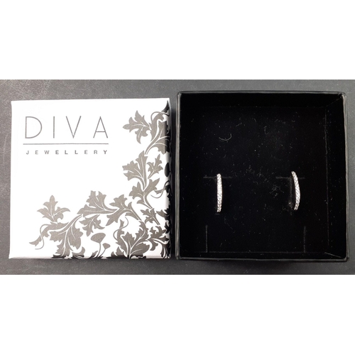 37 - A super little collection of silver and white metal jewellery items to include a 925 marked ingot on... 