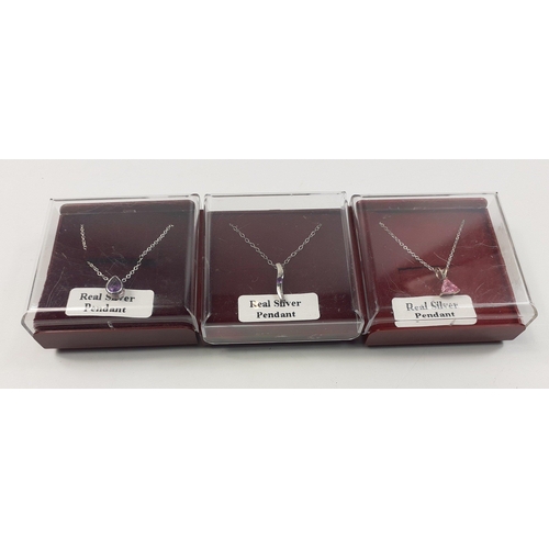 38 - A collection of silver jewellery to include a CHARLES RENNIE MACKINTOSH necklace and earring set and... 