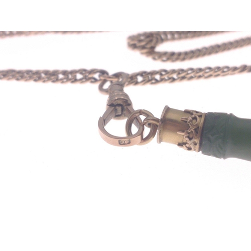 8 - A jade pendant 5cm long with a carved face with 9c chain approx 90cm, weight approx 26g. Total  gros... 
