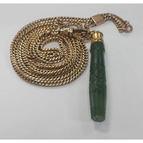 8 - A jade pendant 5cm long with a carved face with 9c chain approx 90cm, weight approx 26g. Total  gros... 