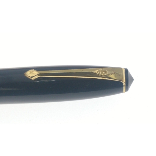 80 - A vintage CONWAY STEWART 15 Fountain pen.  Black barrel with gilt fittings and a 14ct gold nib.  Nic... 