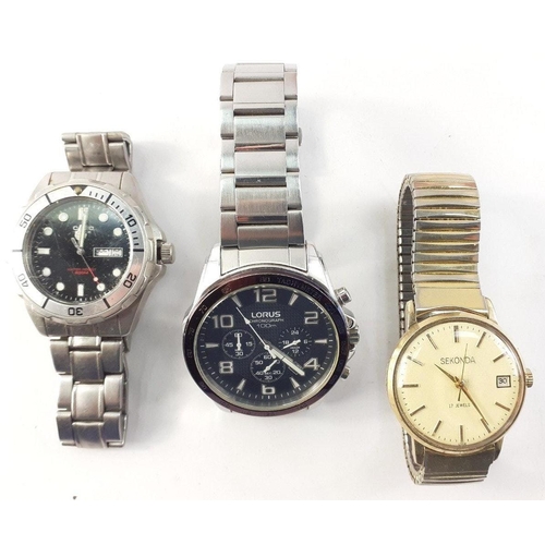 82 - A tin of old watches including Sekonda, Lorus, Timex etc plus a vintage Russian SLAVA clock, face 6c... 