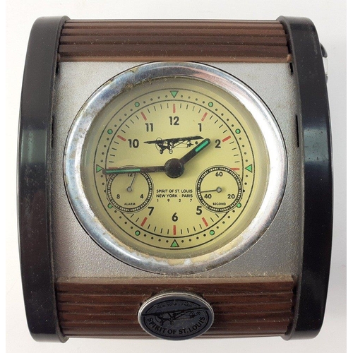 83 - Two timepieces being a reproduction Spirit of St Louis clock and an Identity watch#84