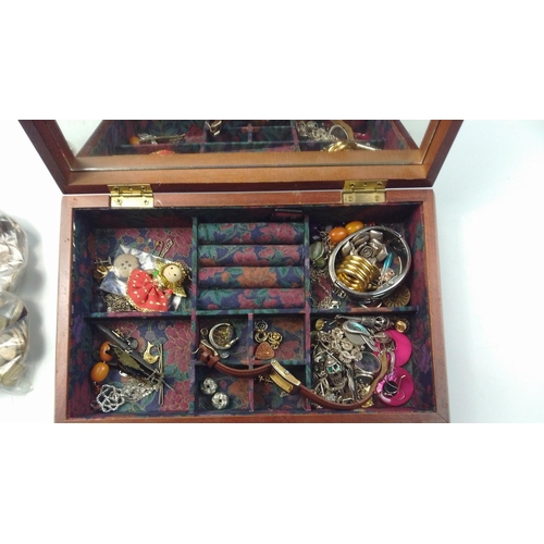 35 - A wooden jewellery box with padded fabric lid and mirrored interior (28x18x8cm approx)with contents ... 