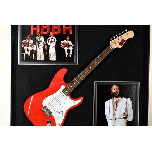 100 - A stunning framed item of ABBA memorabilia which has incorporated within the large box frame a guita... 