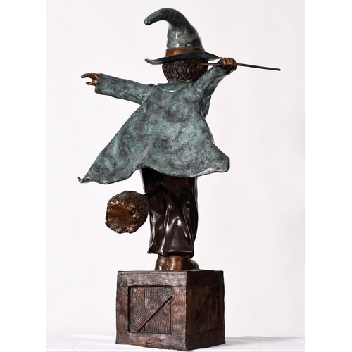 103 - A wonderful hand cast bronze figure of a wizard that stands around 4ft high. It has been skilfully h... 