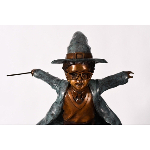 103 - A wonderful hand cast bronze figure of a wizard that stands around 4ft high. It has been skilfully h... 