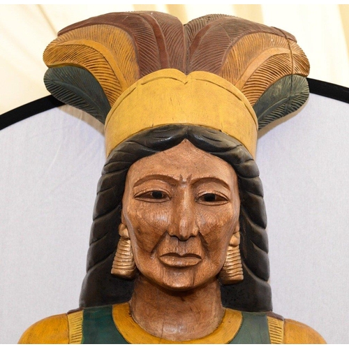 109 - A very heavy and large hand carved solid wooden Indian with hand coloured detailing. Please check th... 