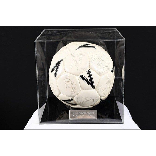 118 - A multi-signed football with original England Football Team signatures. Complete with Perspex case. ... 