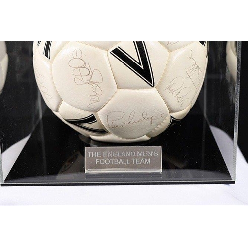 118 - A multi-signed football with original England Football Team signatures. Complete with Perspex case. ... 